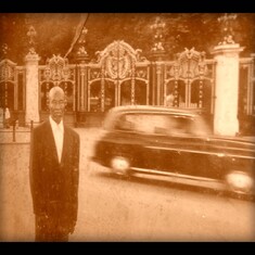 Pa with the iconic London taxi at Buckingham Palace, London 1998