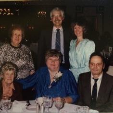 Bottom: :Pat with Jerome and his mother, Top row: Aunt Helen, Mike and Mary Gudjones
