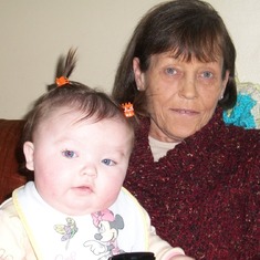 Pat with Her grand baby Lilly. A moment in the sun while the clouds hung over her. Pat & little Lilly as we called her. strike a pose for us.