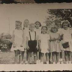 1940s photo of young Pat (2nd from left)