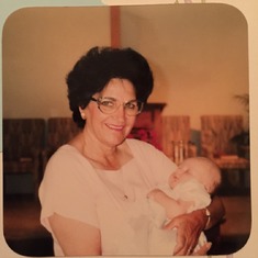 Mom holding her grandson Anthony Roberto Pasquale Fabiano (Tony) at his baptism; 1994