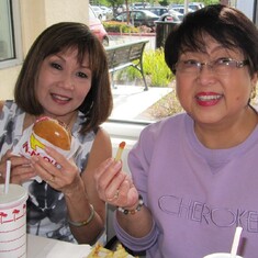 Pat and Kate enjoying burgers and fries