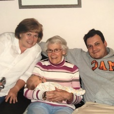 Patricia with her Mom, her son Greg and her grandson Logan.