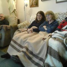 Patricia watching TV with her mother, daughter & brother. Father Gerard, Nadine, Patricia and Mona.