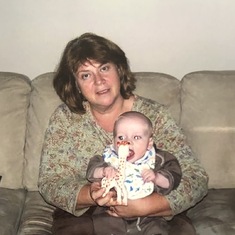 Patricia with her first grandbaby, Logan.
