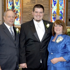 Patricia and Randy with their son, Anthony, on his wedding day.