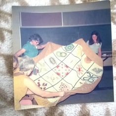 Pat creating a quilt with her mother and 4H group