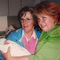 Two grandmas with grandbaby Logan (Mary Passmore and Pat )
