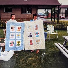 Pat and her sister, Rosemary, with the quilts they made for their babies, Shawn & Shawna 
