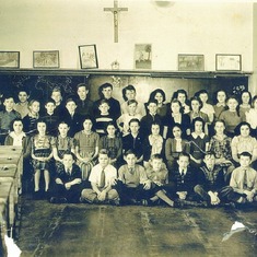 St James school picture, 7th grade, Patsy is back row, second from right.