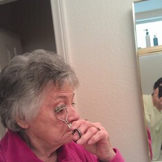 moms first time putting on makeup.