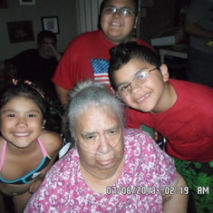 Mom with her grandkids that she loved with all her heart.