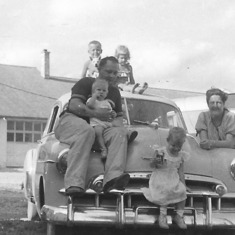 Smith Family - Mom always said she could still remember how warm the car was when they took this picture.