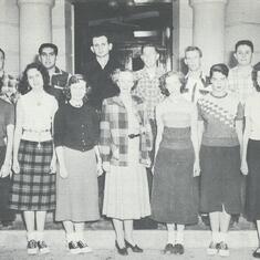 Mom, 1st row, plaid skirt