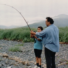 Pat teaching Roy to fish