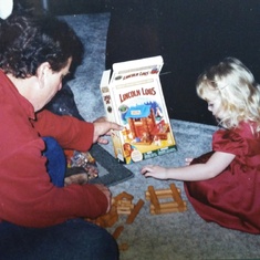 Pat and my daughter building with Lincoln Logs. 