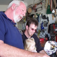 Grandpop showing Steve and Destiney his Harley-