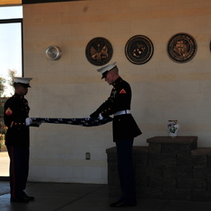 Marines folding the flag ceramony