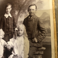 Looks to me like Bud’s Dad (front left) has a sister who had been hoping for another sister