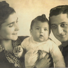 Uncle Leon, Dad's sister Rushka and their child, Jochevet (June 1943)