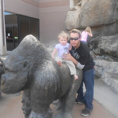 bella got her first trip to the zoo she loved the piguins but not so sure on the gorilla statues