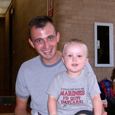 Seeing Paul off at the airport as he headed to Iraq in 2007. Drake's t-shirt was a gift from his uncle. It says "If I could get into the Marines, I'd quit daycare."