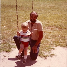 Swinging with Dad.