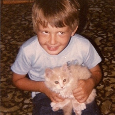 Paul with one of our random farm cats