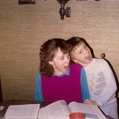 Paul helping his big sister with her homework. He was probably about 2nd grade in this photo.