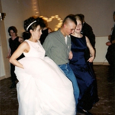 Dancing the Cotton-Eyed Joe at my wedding, 2001.
