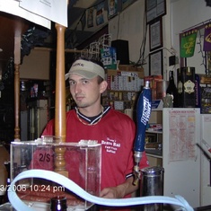 Paul tending bar at the Brass Rail, one of his jobs/hobbies