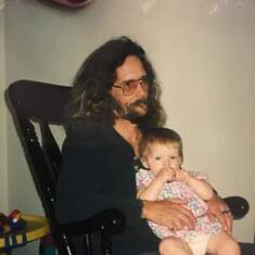 Pops and Christy, on Christy's 1st birthday... rocking her when she wasn't feeling well.