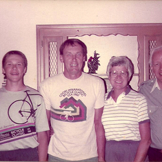 Glenn, Paul, Lois, and Lois' cousin Dick in Estes Park, Colorado. Glenn and Paul rode their bicycles home to Whitewater from Colorado.