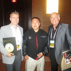 Paul Kubler (Russia), Eiji Tazuka (Japan) with Paul at the 50th Gold's Gym anniversary