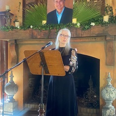 Joanna speaking at Paul's memorial
