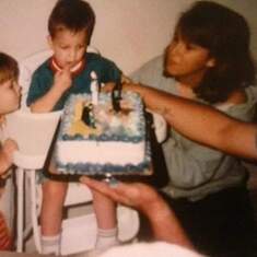 So long ago.... Papa my baby sister Sierra little brother Zachary in the highchair and me right ther