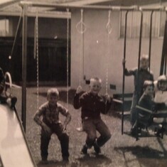 Neighbor kids enjoying the Lavery swing set...