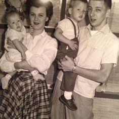 Mom and Dad with Wade (oldest) and Rob (2nd child)