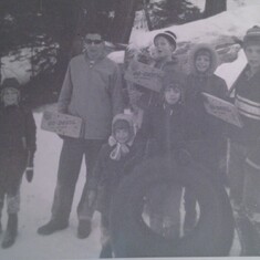 Family Christmas time up in Lake Tahoe . playing in the snow and going down the hill with  intertubes and "Go Devils"