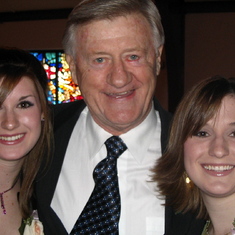 Dad always liked to get in the middle of the picture. With his grands Erin and Kelsey in 2005. 