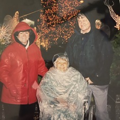 Helen Schmitt joins Paul and Barbara in NYC for the holidays. In wheelchair in the rain. 