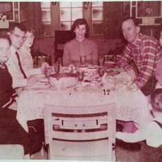 Holiday dinner - Ginny, Howard, Irene on the left - Doris at the rear - Ted and Peggie on the right