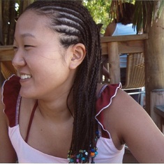 Negril, Jamaica, April 2004.  Peggy's braids.