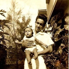 Daddy Pete carrying Mari Chris (Ninay) in Emilia home...