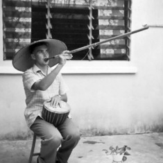 1959 - Peter practicing his musical skills in Butterworth, Malaysia.
