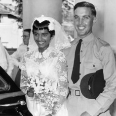 1959-04-04 - Peter and Kotha getting ready to depart for their wedding reception at the Eastern & Oriental Hotel in George Town.