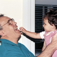 1994-12 - Peter playing with his grand-daughter, Theresa.