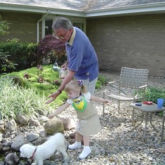 Sweet memories with Grandpa Peter by the Koi pond 