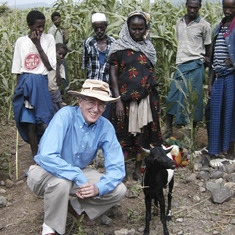 Ethiopia Peter w goat by cornfield