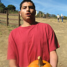Hauling a pumpkin.